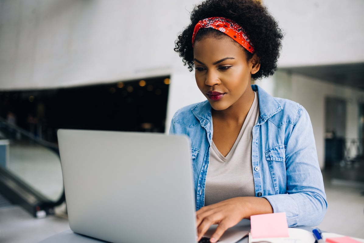 Female Entrepreneur Working on a Laptop